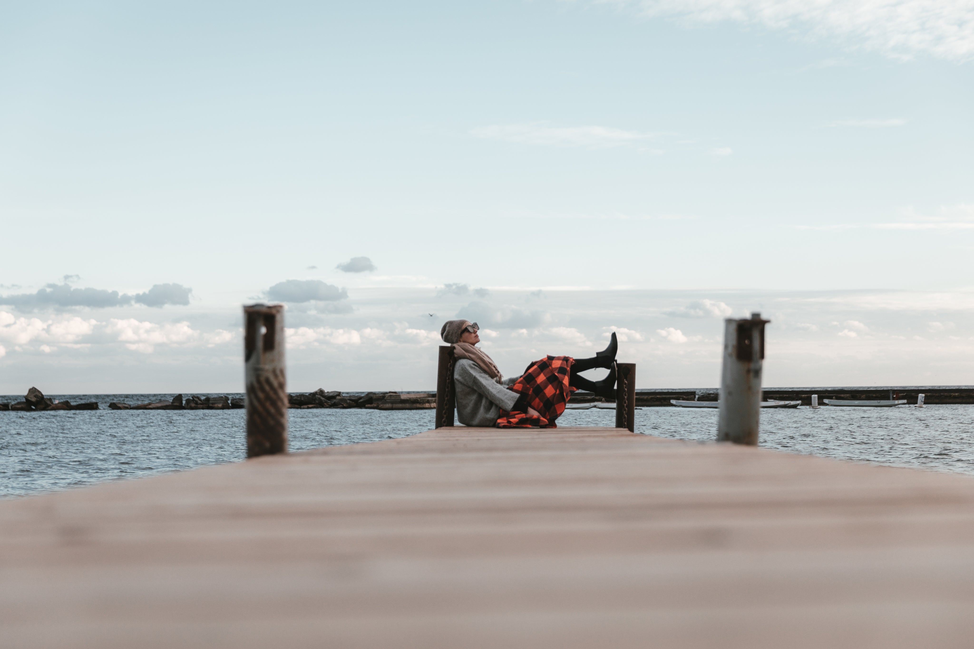 files/young-woman-sitting-at-the-edge-of-a-dock.jpg